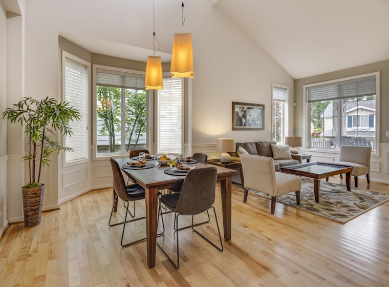 Dining set beside a window